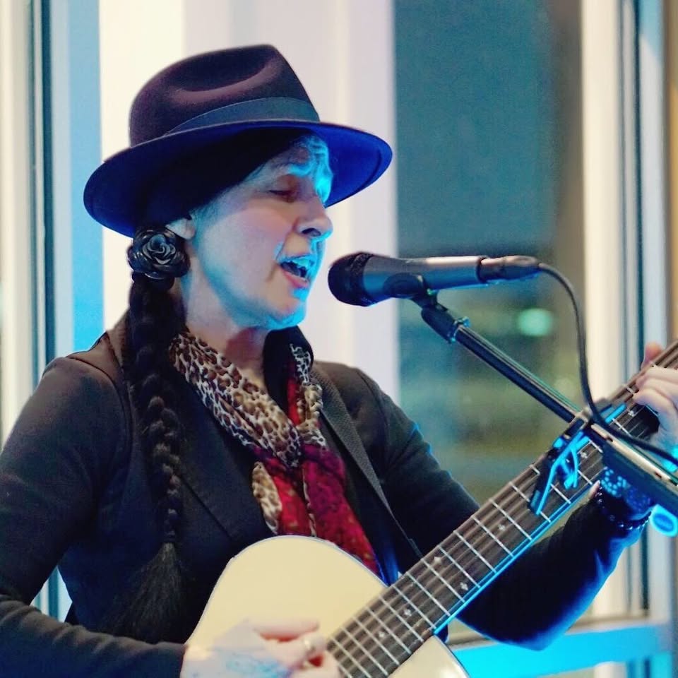 Cooie DeFrancesco (Cooie Sings) performing live music